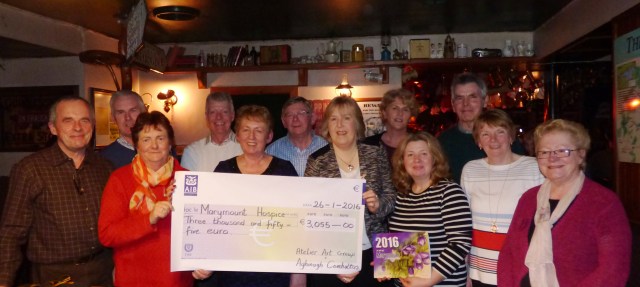 Members of Aghinagh Comhaltas making a presentation to Marymount Hospice charity
