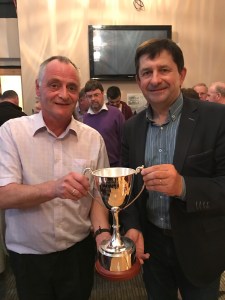 – (L to R)Michael O’ Riordan presents the Patrick O Riordan Trophy to Cal Healy of the Coachford & District Trout Anglers Association